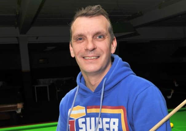 Mark Davis came through his opening match in the German Masters Qualifiers on a respotted black in the deciding frame