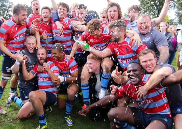 Chichester Players celebrate promotion after the play-off win versus Eton Manor   Picture by Chris Hatton