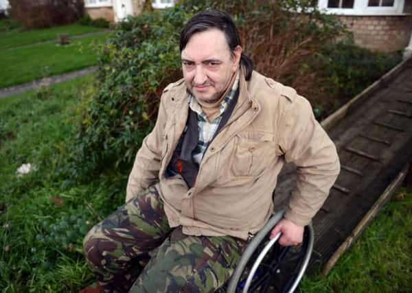 WH 151214  Disabled man Jon Ball, has lost his benefits, despite being a wheelchair user and suffering from a debilitating condition. Photo by Derek Martin SUS-141215-214150001