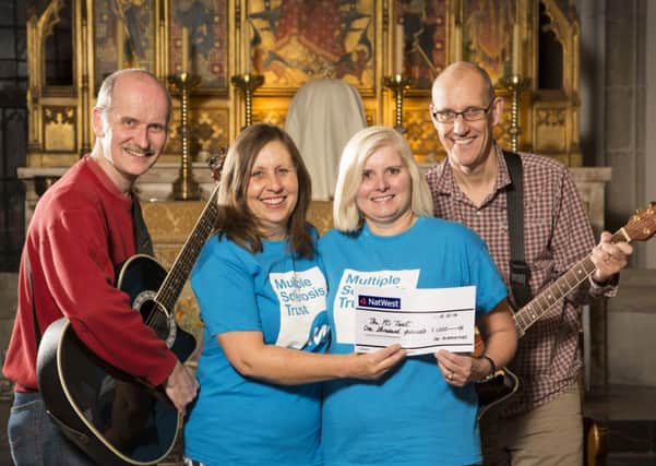 Members of The Alternatives,William Spurway (left) and John Prideaux (right), are pictures with MS nurses Lisa Black(centre left and Katrina Orchard