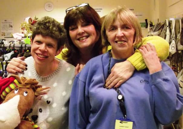 4Sight volunteer Elaine Couttie, shop manager Sarah Brooks and Carolyn Annal, a fellow volunteer