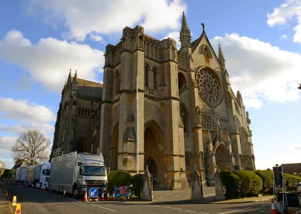 The street outside the cathedral was packed with lorries and broadcasting equipment