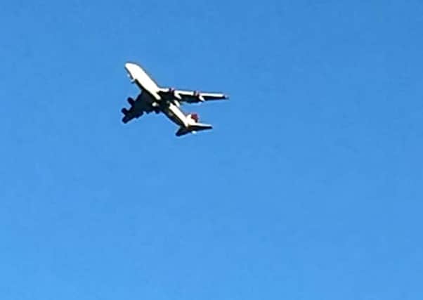 The Virgin 747 is seen circling over Sussex