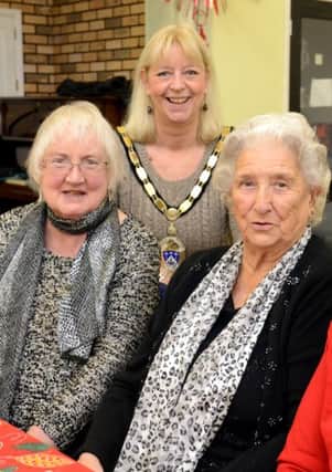 Mayor Jill Long, centre, with members of the Wednesday Community Group during their Christmas lunch D14501821a