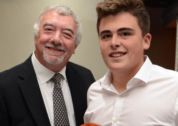 John Virgo presents the Young Sportsperson of the Year Award to Charlie Strickland