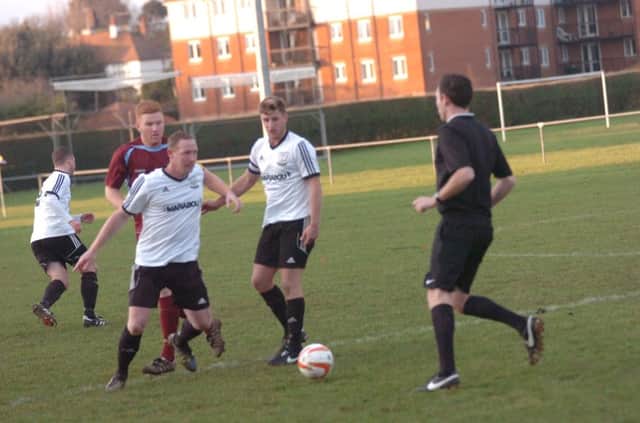 Andy Atkin on the ball for Bexhill United during their 1-0 win at home to Little Common last weekend. Picture by Simon Newstead (SUS-141229-092807002)