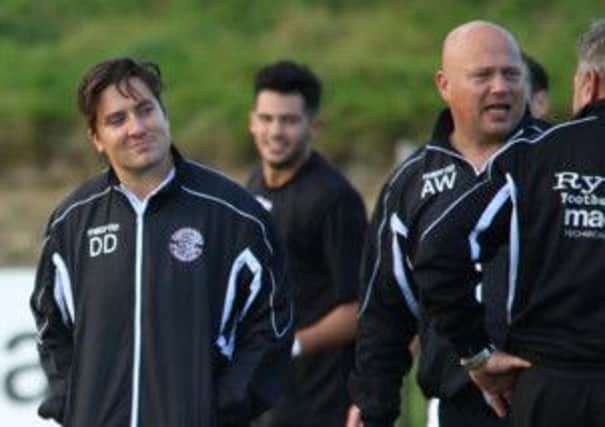 Dom Di Paola (left) in happier times after winning his opening game as Hastings United manager against Guernsey in October. Picture courtesy Joe Knight