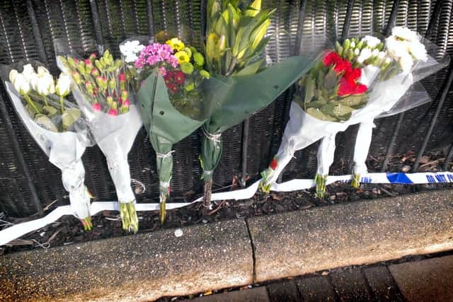 Tributes left at the scene of a fatal hit and run on New Year's Day at Warrior Square. SUS-150201-125440001