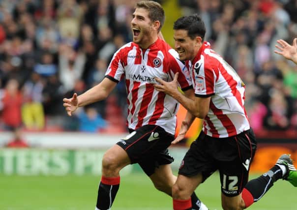 Sheffield United's Ched Evans (left) celebrates scoring with team mate Jean Calve ENGPPP00220110805172338
