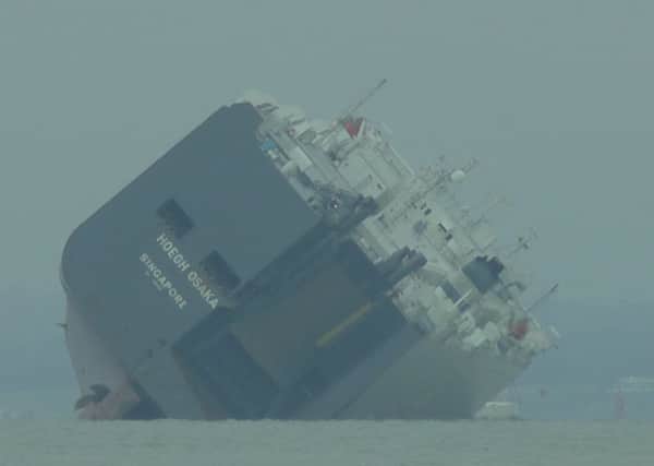 Hoegh Osaka transporter ship grounded in the Solent. Pictures and video taken by Michael Dangerfield, whose grandparents live in Chichester
Whightproductions.co.uk SUS-150501-154434001