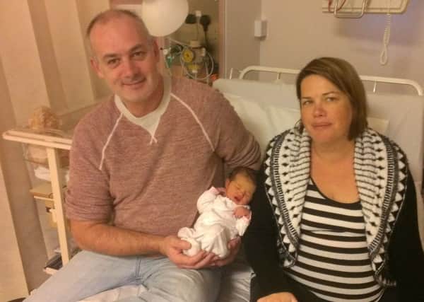 Doug and Lynne Pearce with their New Years Day baby, Erin