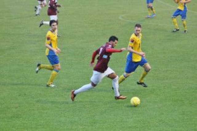 Taser Hassan on the ball for Hastings United during their 2-1 defeat at home to Burgess Hill Town on Saturday. Picture courtesy Joe Knight