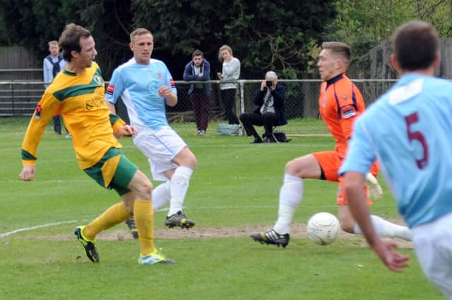 Action from last season's fixture between Horsham and Hastings United. Picture by Steve Cobb