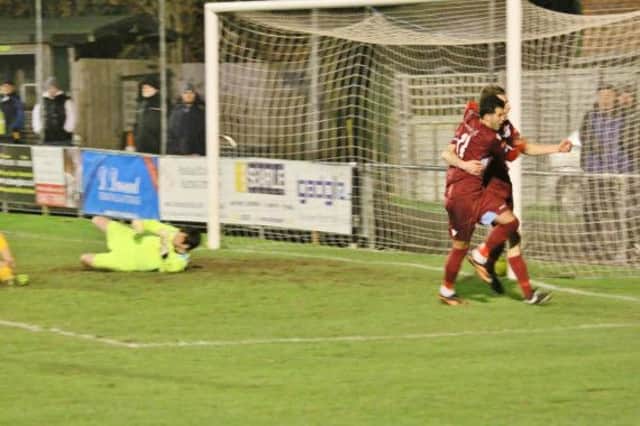 Hastings United celebrate their winning goal during the 2-1 victory at Horsham on Wednesday night. Picture courtesy Joe Knight
