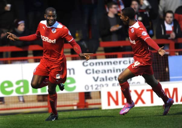 Izale McMcLeod scores his second goal for Crawley against MK Dons (Pic by Jon & Joe Rigby) SUS-151001-182413002