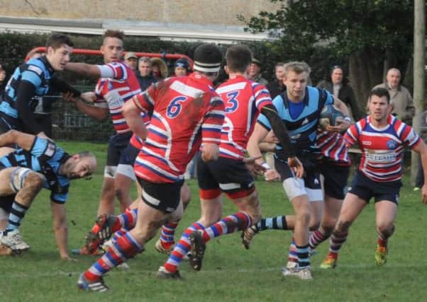 Ed Durkin makes a break in the previous week's tussle with Tonbridge    Picture by Kate Shemilt C141507-6