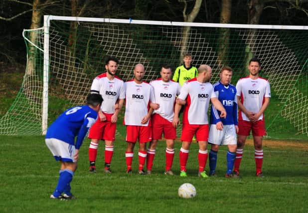 St Leonards Social line up a free kick during their 1-0 victory over Peche Hill Select at Tilekiln on Saturday. Picture by Steve Hunnisett (SUS-151001-153010002)