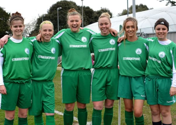 Chichester Ladies' development-team players with new training tops sponsored by StraightPoint