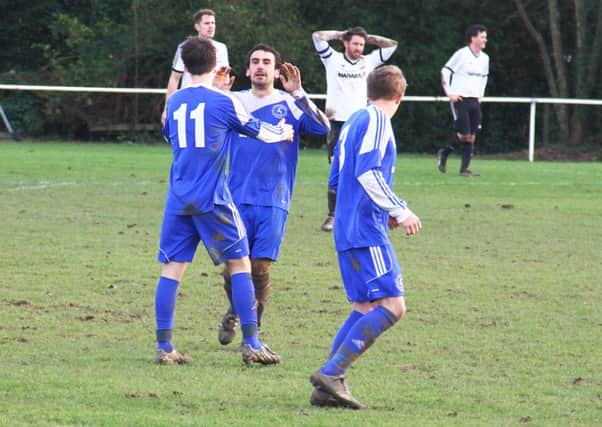 Midhurst celebrate one of the goals that beat Bexhill   Picture by Darren Chiverton