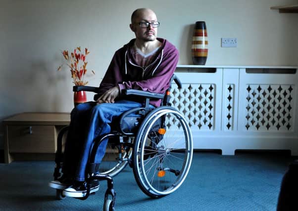 Simon Gray has been paralysed from the chest down since he broke his neck in 2012. He is being moved to Peacehaven, away from his social support network.
Pic Steve Robards SUS-150113-174152001