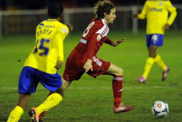 Crawley Town's Ex player and fans favourite Sergio Torres battles for possesion as his Whitehawk team thrash the under strength Crawley Team 6-1 in the Sussex Senior Cup (Pic by Jon Rigby) SUS-150114-105214002