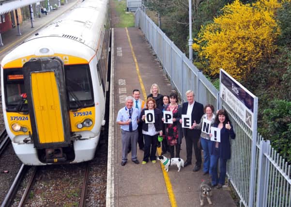 2/4/14- Commuters and local business leaders celebrating after the Battle railway line reopened SUS-140204-114135001