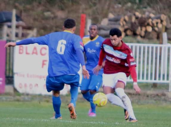 Taser Hassan on the ball for Hastings United during their 2-1 defeat at home to East Grinstead Town last weekend. Picture courtesy Angela Brinkhurst