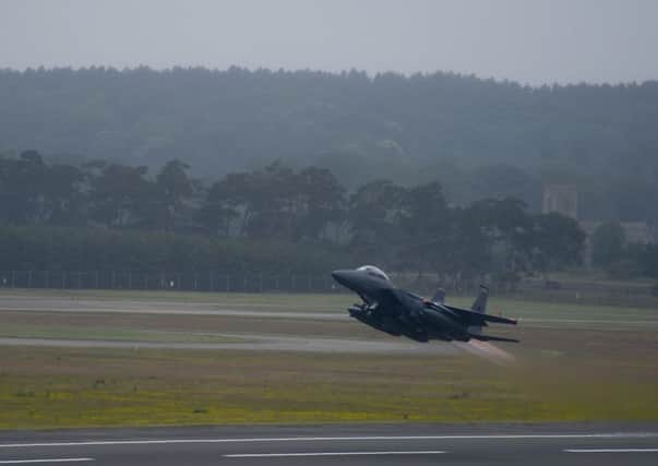 An F-15E Strike Eagle departing RAF Lakenheath