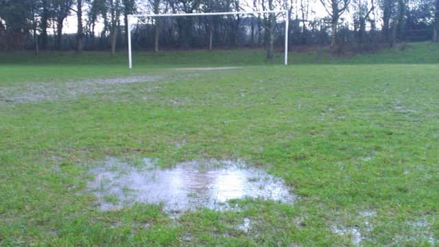 A waterlogged pitch at Tilekiln in St Leonards yesterday (SUS-150118-135820002)