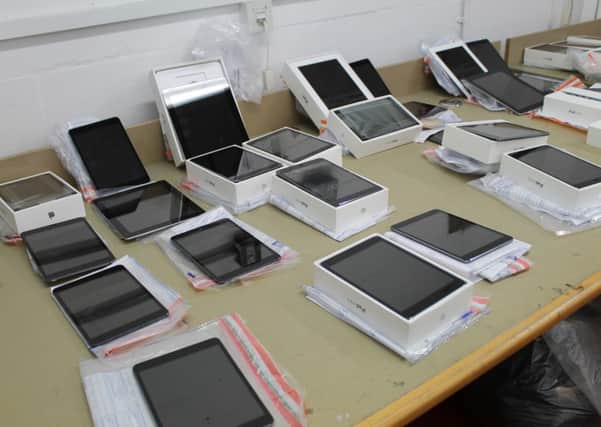Some of the iPads recovered by Sussex Police