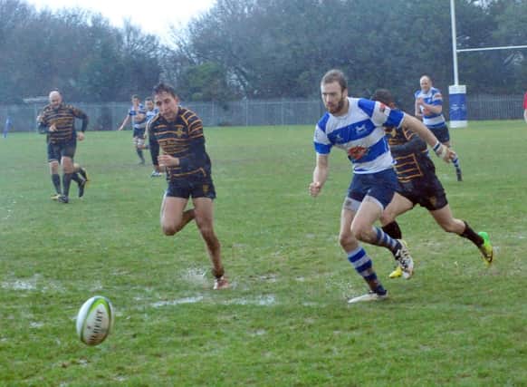 The chase is on during Hastings & Bexhill Rugby Club's narrow defeat at home to Bromley on Saturday. Picture by Steve Hunnisett (SUS-150117-161028002)