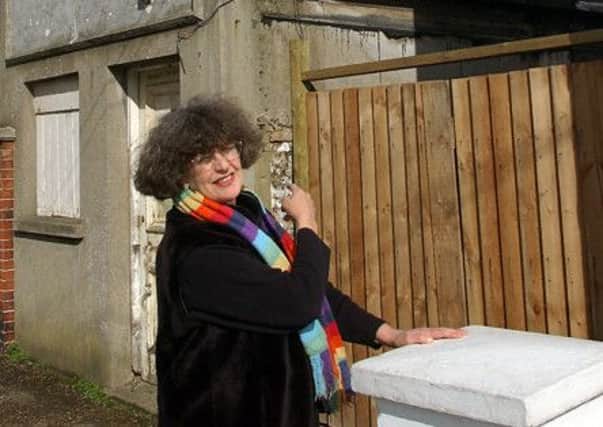 Jeannie Millington is pictured beside the ostlers room in Terminus Place, Littlehampton, in 2007, when she was campaigning to have it restored