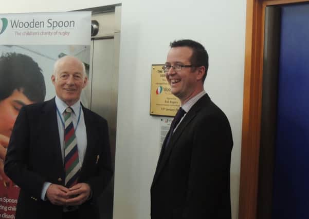 Phillip Potter with Bob Rogers at the opening of the new playroom