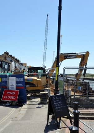 Businesses in Pier Road were hemmed in last summer as the flood scheme progressed