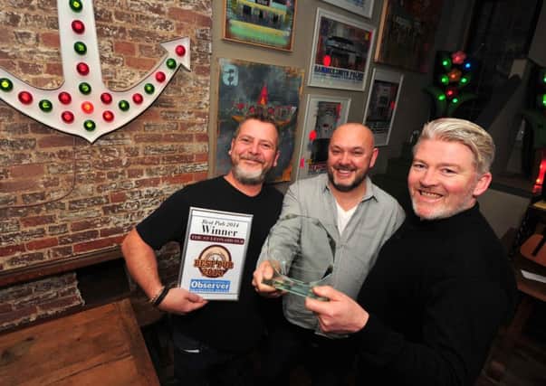20/1/15- Pub of the Year- The St Leonard.  Chris Leech, Philip Quanton and Tom Foley. SUS-150120-122959001