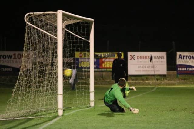 Ramsgate goalkeeper Nick Shaw is beaten by a Sam Adams penalty during Hastings United's 1-0 victory at The Pilot Field on Monday night. Picture courtesy Joe Knight