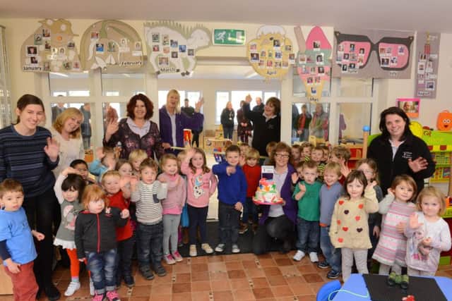 Its all smiles for the toddlers and staff at William Older Playschool after its £100,000 cash boost D15041088a