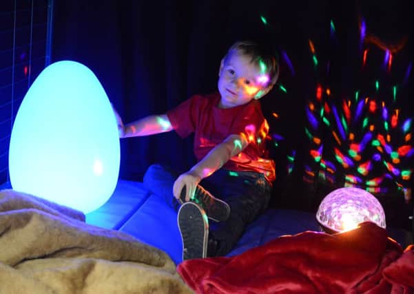 One of the youngsters enjoys his time in the new sensory room D15041134a