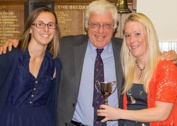 Gemma Halford and Pam Baker pick up awards from John Reeve  Picture by Bob Hoare