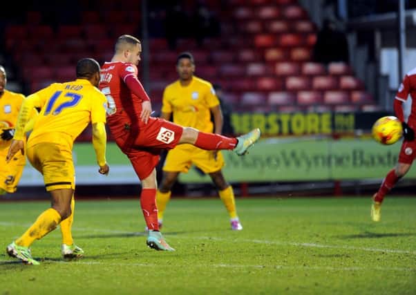 Lee Fowler scores the all important winner for Crawley Town against Preston North End (Pic by Jon & Joe Rigby) SUS-150131-183443002