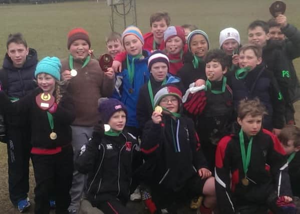 Heath Under 11s show off their H Cup medals