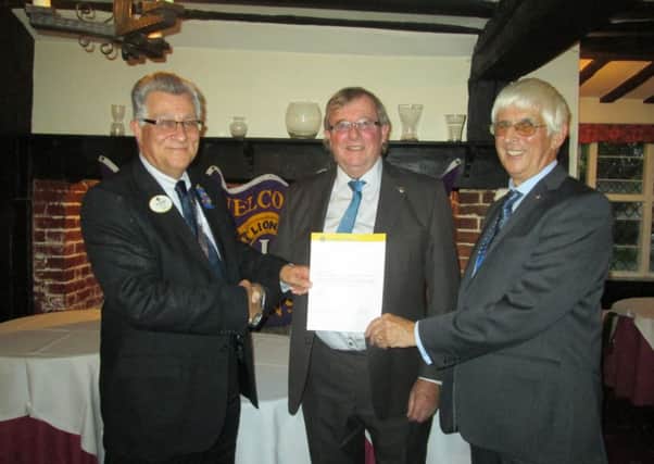 Terry Mason District Governor, Bob Harvey, Terry Cobby President Rye & District Lions SUS-150302-124626001