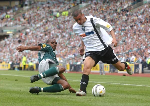 Pic by Cate Gillon.  22/3/04  For Sport: The Tennent's Scottish Cup Final at Hampden Park. Dunfermline  v Celtic.  1-3 Dunfermline: Richie Byrne Celtic: Didier Agathe mmpix20130123144212