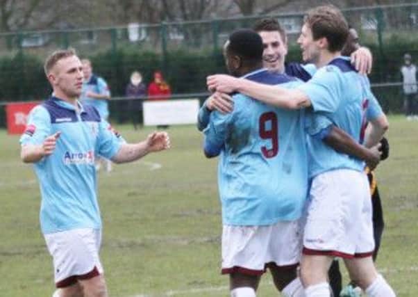 Hastings United celebrate after taking the lead away to Merstham on Saturday. Picture courtesy Joe Knight