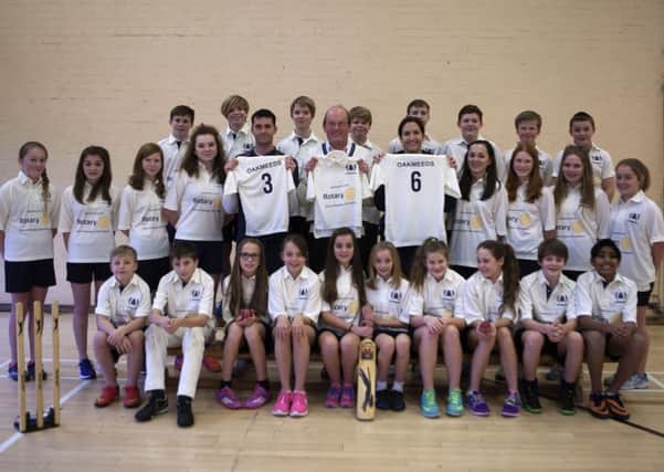 Oakmeeds Community Colege cricket teams with their new kits sponsored by Burgess Hill Rotary Club SUS-150502-101612001