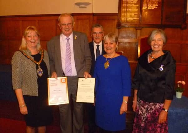 Mike Cullern, second from left, receiving his awards