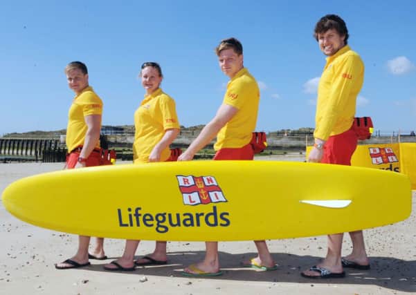 Soak up the summer sun and help keep beach-goers safe L18802H13