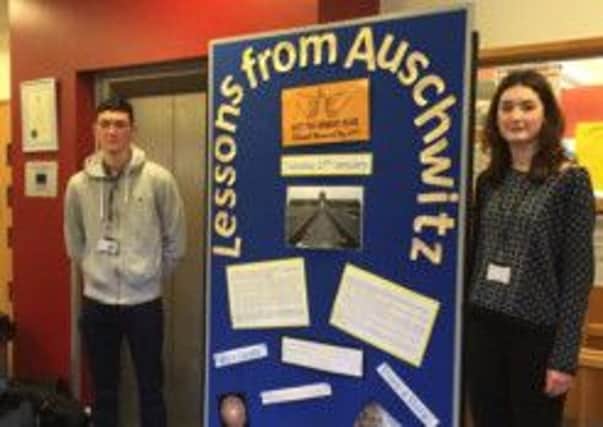 Jacob Iles-Chew and Saoirse Freeman with one of their displays SUS-150602-121649001