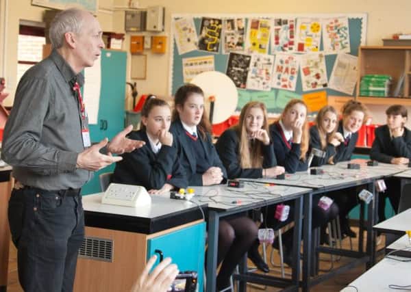Steyning Grammar School students learn about the brain with the Brighton Science Festival SUS-150902-111655001