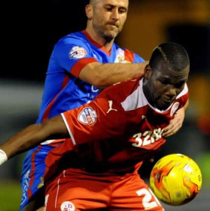 Crawley Town's Mathias Pogba battles for possession against Doncaster (Pic by Jon Rigby) SUS-151002-235758002